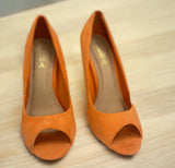 Heeled Orange Pumps